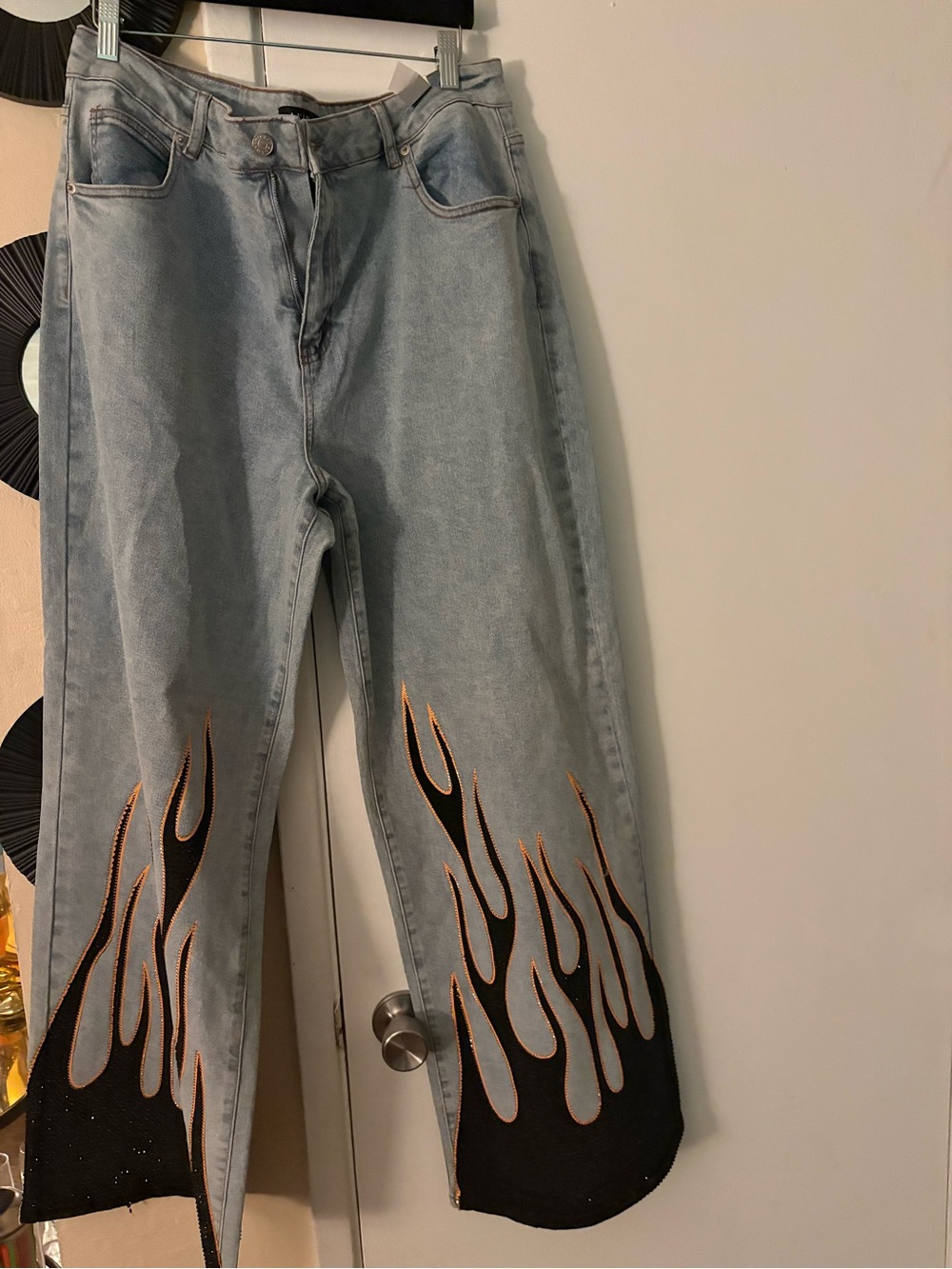 AKIRA Light Wash Wide-Leg Jeans with Black & Orange Flame Hem